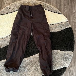 Black high waisted cargo pants. Runched ankles. Size medium.